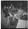 Image of Three women talking at nightclub table, Seattle, circa 1945
