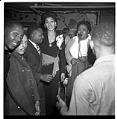 Image of Women singing at microphone at the Black & Tan nightclub, 1944