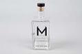 Image of Glass bottle of hand sanitizer from Fremont Mischief Distillery, 2020