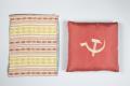 Image of Hammer and sickle cushion with handwoven cover from Lithuania, ca. 1961