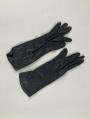 Image of Black gloves, worn with black dress ensemble, 1961